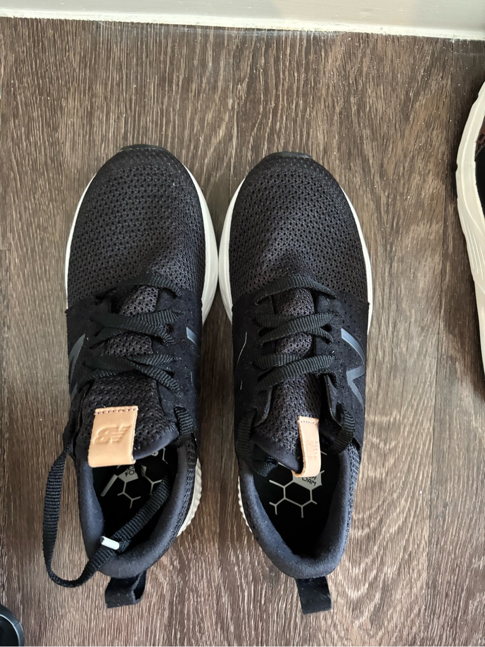 New Balance Black Knit Athletic Shoes with White Sole